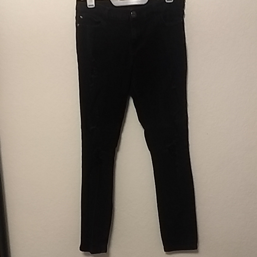 Ripped black skinny leg jeans